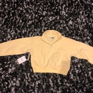 TNA cropped quarter zip